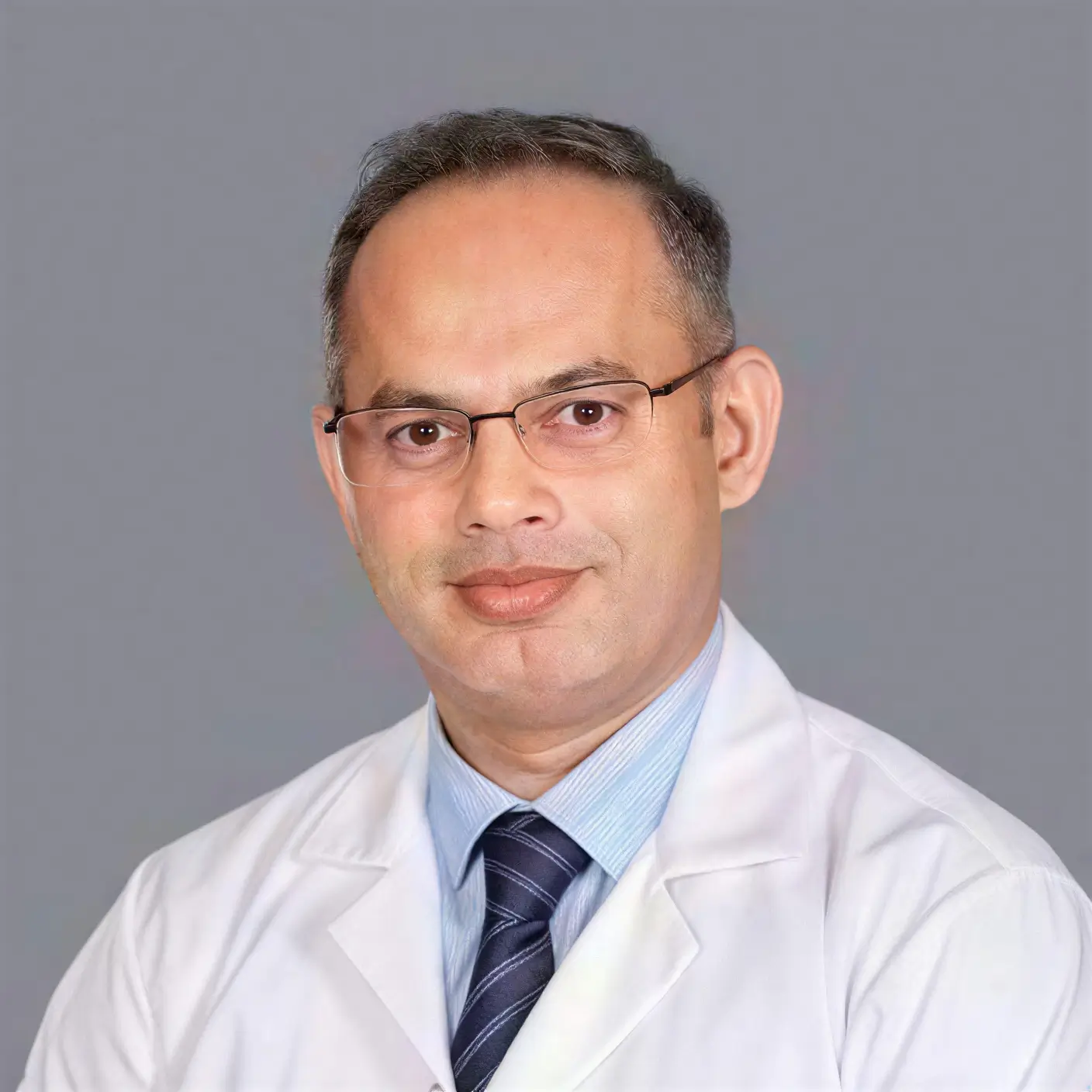 Dr. Aby Madan